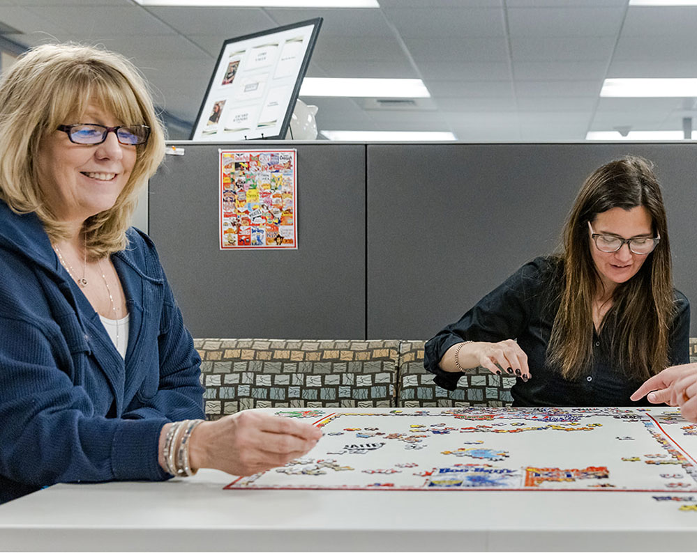 employees doing puzzles